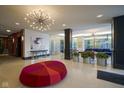 Beautifully decorated lobby area with unique chandelier and comfortable seating at 3965 N Meridian St # 3J West, Indianapolis, IN 46208