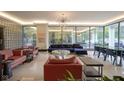 Modern lobby seating area with stylish sofas and a large window view at 3965 N Meridian St # 3J West, Indianapolis, IN 46208