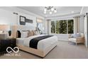 Cozy primary bedroom with a large window and contemporary decor at 5925 Sterling Dr, Whitestown, IN 46075