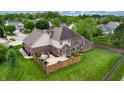 Aerial view of the backyard featuring a fenced-in yard and patio, perfect for outdoor entertaining at 8338 Hunters Meadow Way, Indianapolis, IN 46259