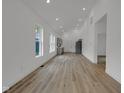 Open-concept living space with hardwood floors and ample natural light at 4234 Kingsley Dr, Indianapolis, IN 46205