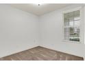 Cozy carpeted bedroom with a window and ample natural light at 5125 Lilium Dr, Plainfield, IN 46168