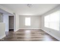 Bright bedroom with new flooring, natural light, closet, and neutral paint at 564 S Bosart Ave, Indianapolis, IN 46203