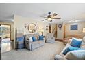 Comfortable living room with neutral colors, comfortable couches, and a decorative wall art at 580 Northgate Dr, Greenwood, IN 46143