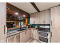 Well-appointed kitchen with stainless steel appliances, modern cabinetry, and sleek countertops at 615 E Stop 11 Rd, Indianapolis, IN 46227