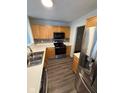 Well-equipped kitchen with modern appliances and ample counter space at 6744 Redan Dr, Indianapolis, IN 46254