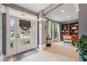 Lovely foyer featuring a light-filled entry and access to the living room at 9833 Parkshore Dr, Fishers, IN 46038
