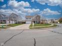 Charming two-story home with a well-manicured lawn and a two-car garage in a desirable neighborhood at 10443 Ringtail Pl, Fishers, IN 46038