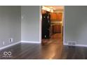 Inviting living room featuring newly installed hardwood floors and neutral wall colors at 3456 S Sadlier S Dr, Indianapolis, IN 46239