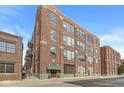 Brick building exterior with a canopy over the entrance and large windows at 630 N College Ave # 204, Indianapolis, IN 46204