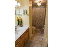 Functional bathroom featuring a vanity with sink, toilet, and shower with curtain at 7402 Broadview Dr, Indianapolis, IN 46227