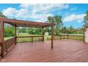 Expansive deck with pergola, perfect for outdoor entertaining and relaxing at 8205 Picadilly Ln, Indianapolis, IN 46256