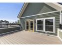 Spacious balcony featuring a bright yellow door and views of the city skyline at 1405 Deloss St, Indianapolis, IN 46201