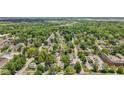 An aerial view of the community, showcasing the abundance of trees and nearby highway at 245 S Washington St, Danville, IN 46122