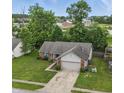 An aerial view showcasing the home's layout, yard, and neighborhood at 34 Westview Pl, Bargersville, IN 46106
