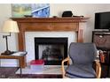 Inviting living room with a fireplace and wooden mantel at 1129 Nantucket Dr, Cicero, IN 46034