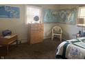 Bedroom with maps, globe, and natural light at 828 N Clarkdale Dr, Muncie, IN 47304