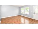 Bright living room featuring hardwood flooring and windows at 8445 Montery Rd, Indianapolis, IN 46226