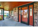 Inviting front porch with a hanging porch swing, perfect for relaxing and enjoying the outdoors at 8619 Wrangler Ct, Indianapolis, IN 46217
