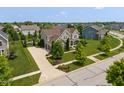 Spacious home with a long driveway and lush landscaping at 1102 Clearwell Dr, Greenwood, IN 46143