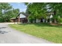 Well-maintained home featuring a two-car garage and a lush, green lawn at 15812 Joliet Rd, Westfield, IN 46074