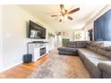 Inviting living room features a large tv with hardwood floors and comfortable seating at 272 Jefferson St, Columbus, IN 47201