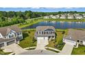 Aerial view of a home with a pond view, showcasing the neighborhood's attractive setting at 6762 Brentwood Ct, Brownsburg, IN 46112