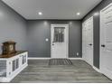Welcoming entryway featuring grey walls, a charming area rug, and recessed lighting at 730 N Forsythe St, Franklin, IN 46131