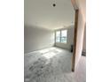 Unfinished bedroom features natural light and a blank canvas for personalization at 7305 Bayview Run # 13-605, McCordsville, IN 46055