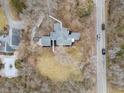 Overhead view of property with road, landscaping, and roof details at 7999 Englewood Rd, Indianapolis, IN 46240