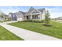 Beautiful exterior of a home with manicured lawn and tasteful landscaping at 1107 Mccray Ln, Westfield, IN 46074