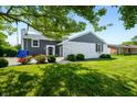 Well-maintained home featuring a blend of brick and siding and a lush, green lawn at 3701 Sandy Hook Dr, Columbus, IN 47203