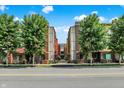 Charming street view of the building, highlighting its colorful facade and inviting landscaping at 622 E 10Th St # 310, Indianapolis, IN 46202