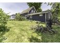 Expansive backyard view featuring a lush lawn and the back of the home at 1393 Wayne St, Noblesville, IN 46060