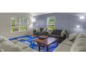 Inviting living room with ample seating, bright windows and modern décor at 1535 Whalen Ave, Indianapolis, IN 46227