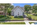 Well-maintained home featuring manicured lawn and landscaping and charming curb appeal at 1539 Evans Ave, Noblesville, IN 46060