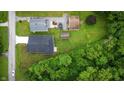 A birds-eye view of a well-kept neighborhood showcasing lush greenery and beautifully maintained homes at 2159 W 58Th Nw St, Indianapolis, IN 46228