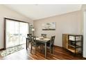 Cozy dining area with sliding glass doors and wood flooring, perfect for Gathering meals at 2442 N Willow Way, Indianapolis, IN 46268