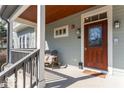 Charming front porch with wooden accents and seating area at 2230 N Pennsylvania N St # 7, Indianapolis, IN 46205
