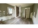 Cozy bedroom with new floors, closet and ample natural light at 2955 N Olney St, Indianapolis, IN 46218