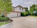Spacious three-car garage with ample parking and a basketball hoop at 4075 Dartmoor Dr, Greenwood, IN 46143