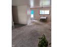 Spacious living area with adjacent dining area and front door at 5807 Sunwood Dr, Indianapolis, IN 46224