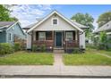 Charming home with well-maintained lawn and inviting front porch at 1529 E Tabor St, Indianapolis, IN 46203