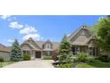 Charming single-Gathering home with a brick exterior, landscaped front yard, and a welcoming entrance at 16550 Gleneagles Ct, Noblesville, IN 46060