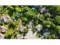 Aerial view of property showing the location of the home in a treed neighborhood at 1819 Quiet Haven Cir, Indianapolis, IN 46229