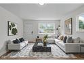 Inviting living room featuring contemporary decor, plush seating, and natural light at 1948 Bloyd Ave, Indianapolis, IN 46218