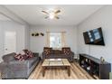 Bright living room with wood-look floors, neutral walls, and stylish decor, creating a comfortable space at 3011 N New Jersey St, Indianapolis, IN 46205