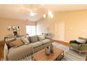 Spacious living room with vaulted ceiling, hardwood floors, ceiling fan, and neutral tones at 4291 Washington Blvd, Plainfield, IN 46168