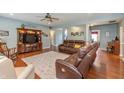 Spacious living room with hardwood floors and comfortable seating at 1696 Woodfield Dr, Greenwood, IN 46143