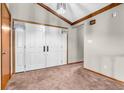 Foyer with neutral walls, plush carpet, and attractive double doors at 407 Woodland E Dr, Greenfield, IN 46140